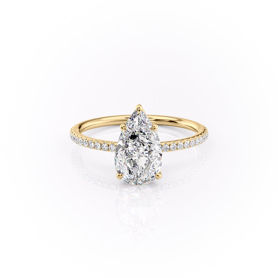 The Pave Lily. A Yellow Gold Nature Engagement Ring Set With A 2ct Pear Lab Grown Diamond. White Background.