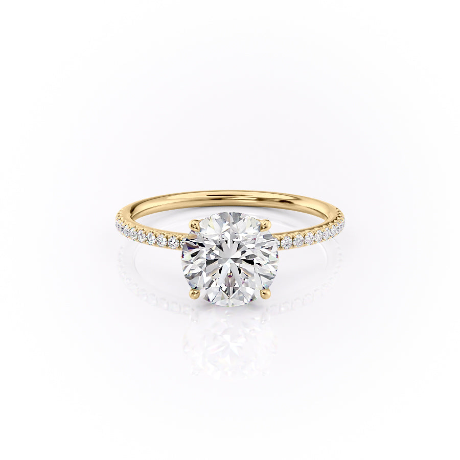 The Pave Lily. A Yellow Gold Nature Engagement Ring Set With A 2ct Round Lab Grown Diamond. White Background.