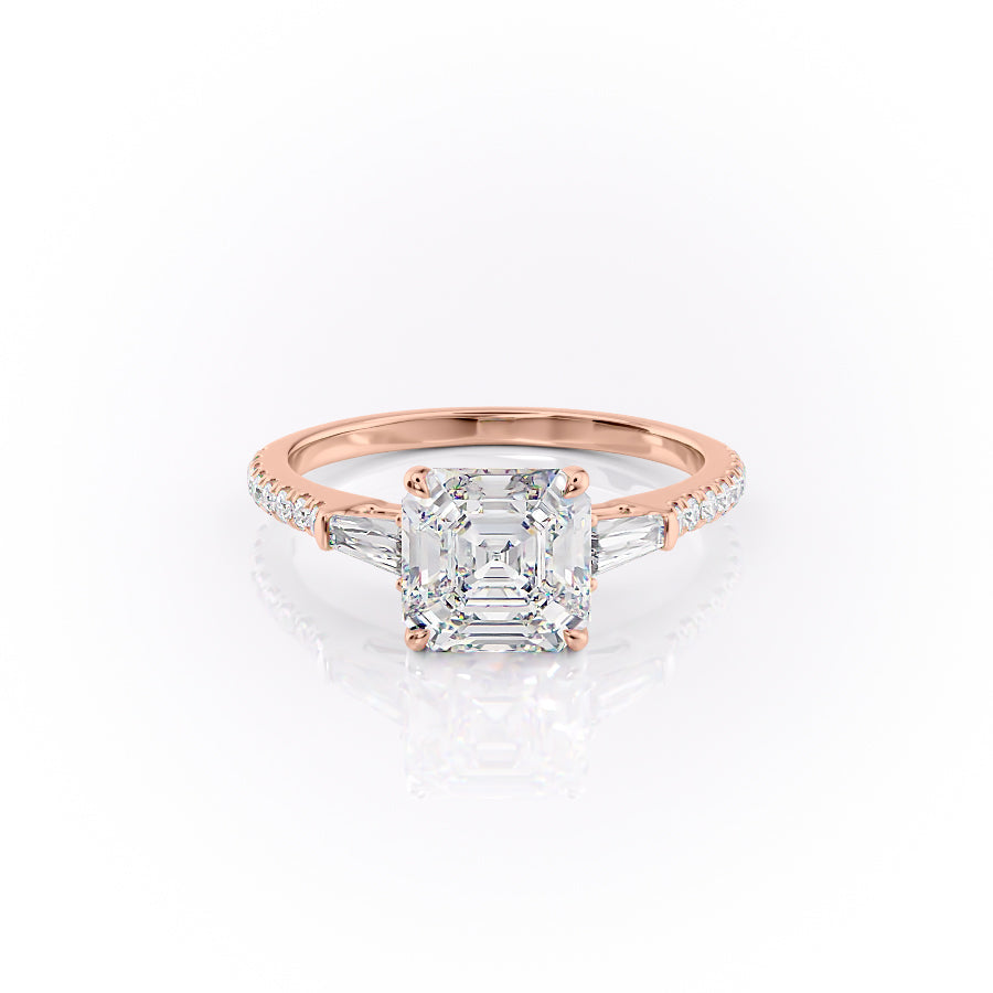 The Pave Liv. A Rose Gold Three Stone Engagement Ring Set With A 2ct Asscher Lab Grown Diamond. White Background.