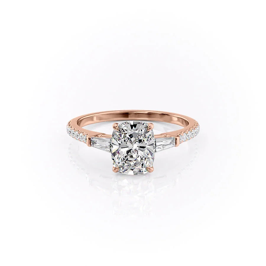 The Pave Liv. A Rose Gold Three Stone Engagement Ring Set With A 2ct Elongated Cushion Lab Grown Diamond. White Background.