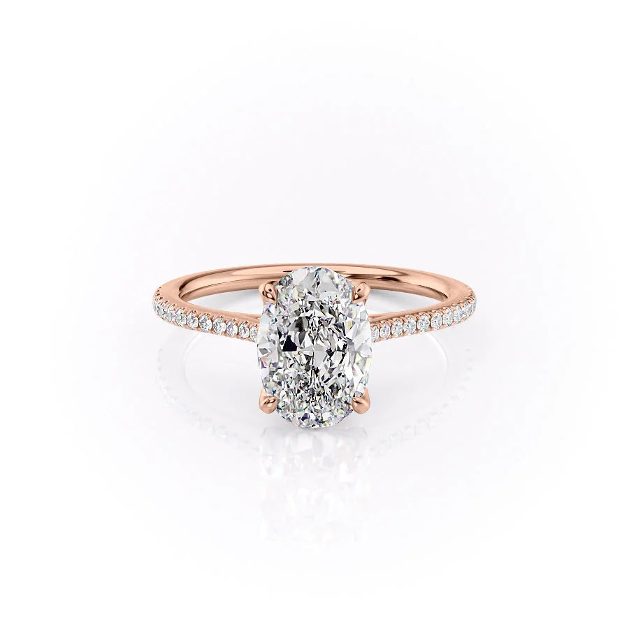 The Pave Madison. A Rose Gold Nature Engagement Ring Set With A 2ct Oval Lab Grown Diamond. White Background.