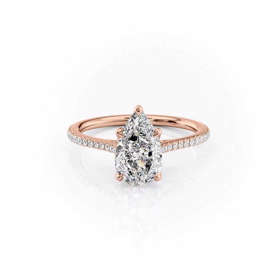 The Pave Madison. A Rose Gold Nature Engagement Ring Set With A 2ct Pear Lab Grown Diamond. White Background.