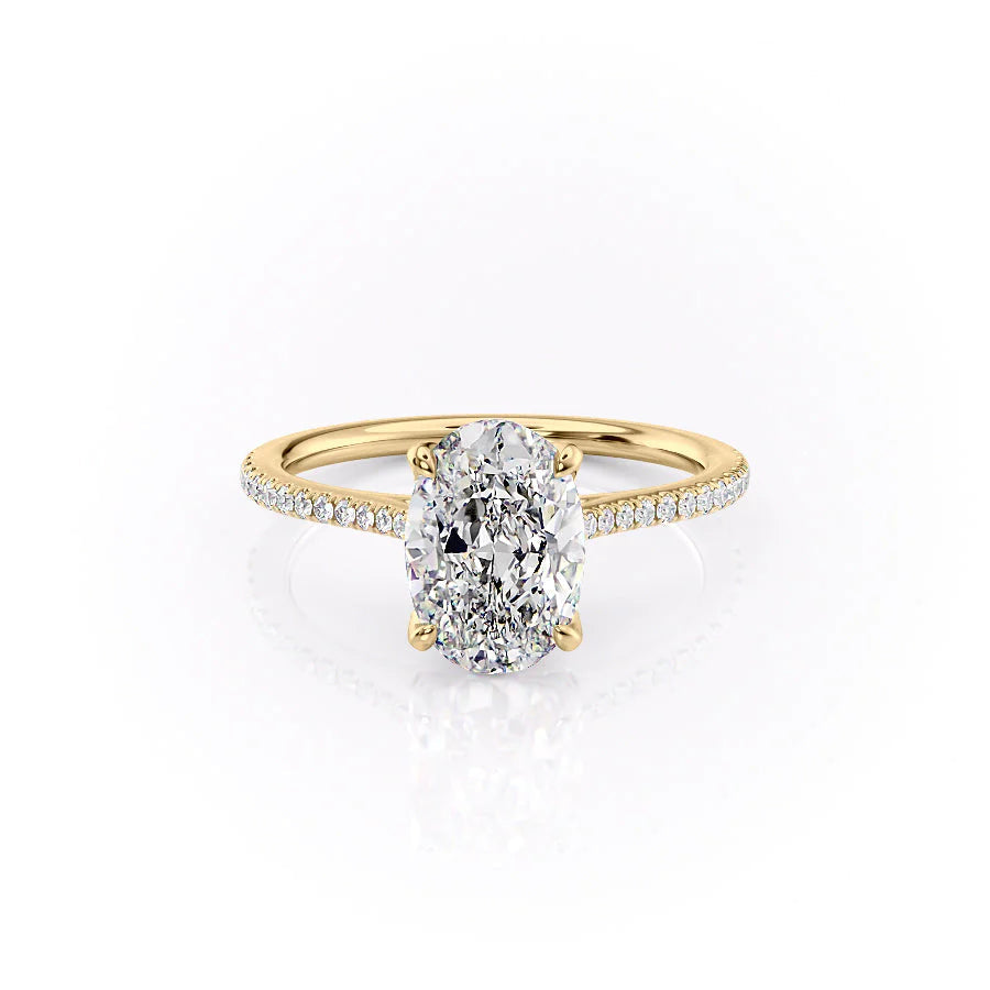 The Pave Madison. A Yellow Gold Nature Engagement Ring Set With A 2ct Oval Lab Grown Diamond. White Background.
