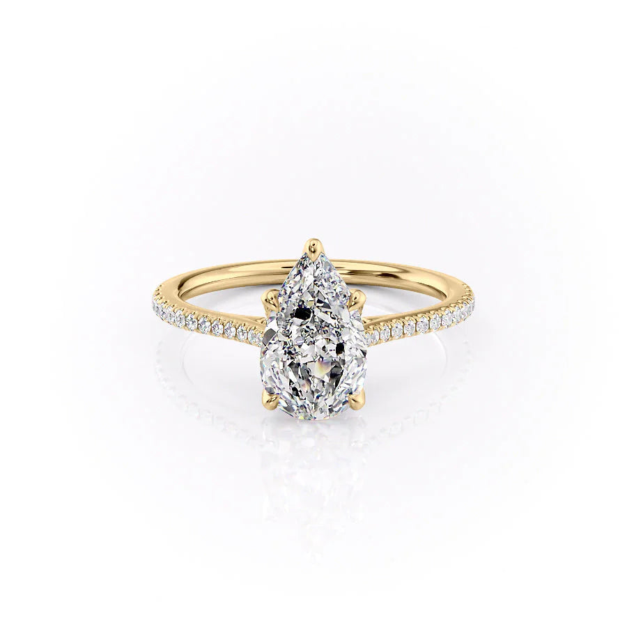 The Pave Madison. A Yellow Gold Nature Engagement Ring Set With A 2ct Pear Lab Grown Diamond. White Background.