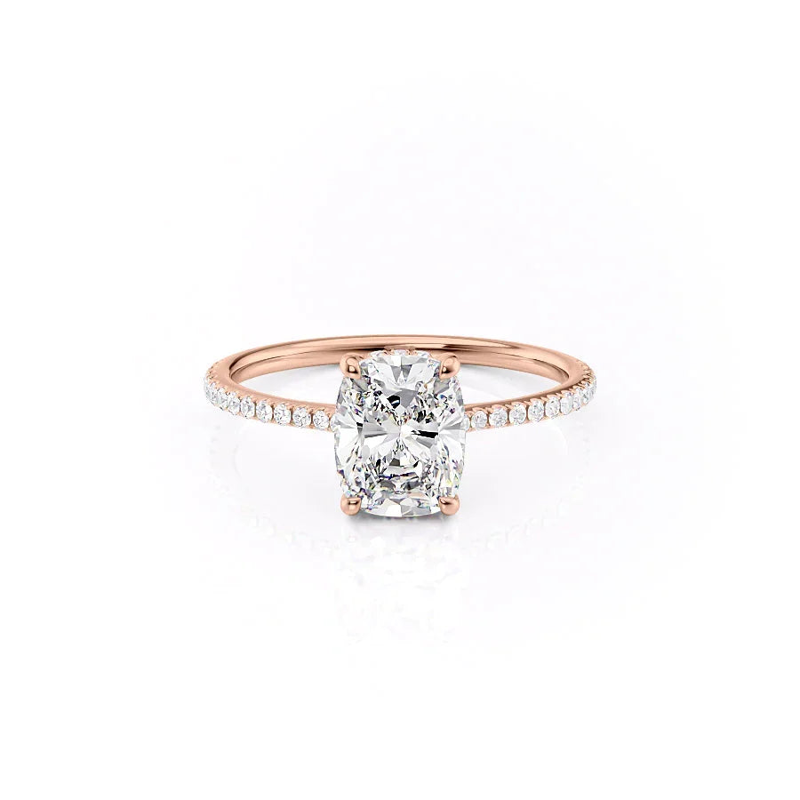 The Pave Maia. A Rose Gold Hidden Halo Engagement Ring Set With A 2ct Elongated Cushion Lab Grown Diamond. White Background.