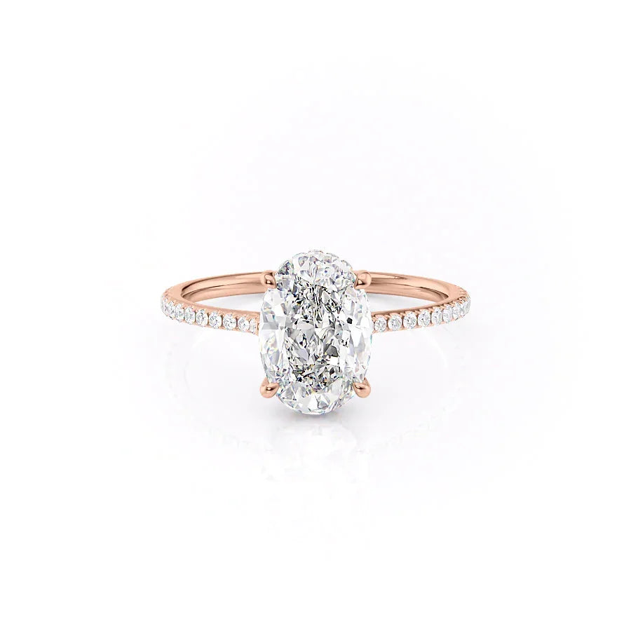 The Pave Maia. A Rose Gold Hidden Halo Engagement Ring Set With A 2ct Oval Lab Grown Diamond. White Background.
