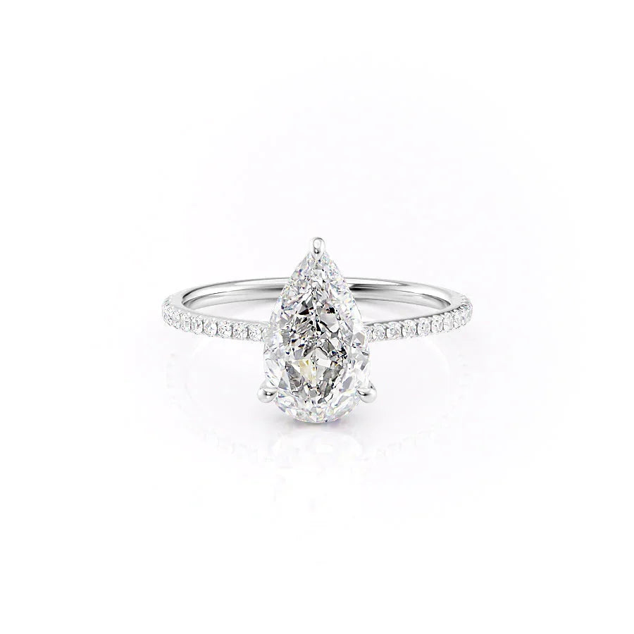 The Pave Maia. A White Gold Hidden Halo Engagement Ring Set With A 2ct Pear Lab Grown Diamond. White Background.