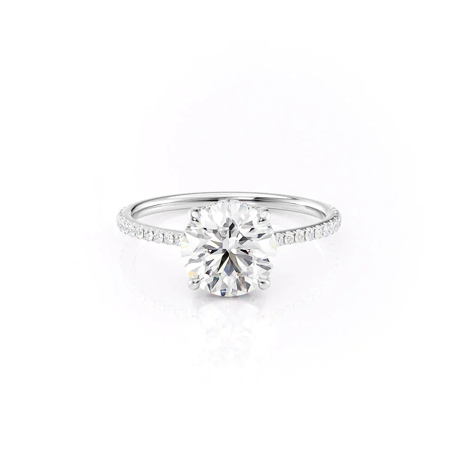 The Pave Maia. A White Gold Hidden Halo Engagement Ring Set With A 2ct Round Lab Grown Diamond. White Background.
