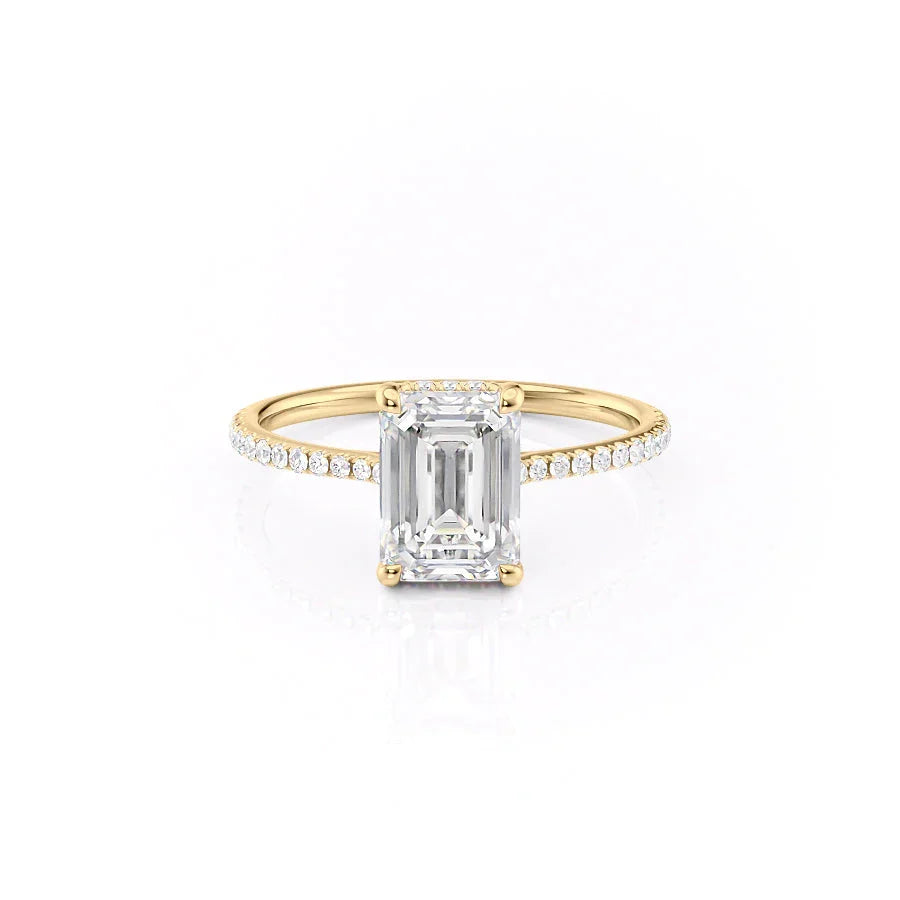 The Pave Maia. A Yellow Gold Hidden Halo Engagement Ring Set With A 2ct Emerald Lab Grown Diamond. White Background.