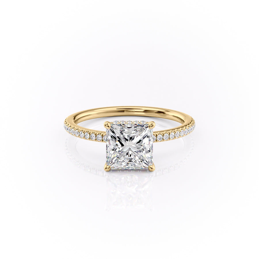 The Pave Margot. A Yellow Gold Hidden Halo Engagement Ring Set With A 2ct Princess Lab Grown Diamond. White Background.