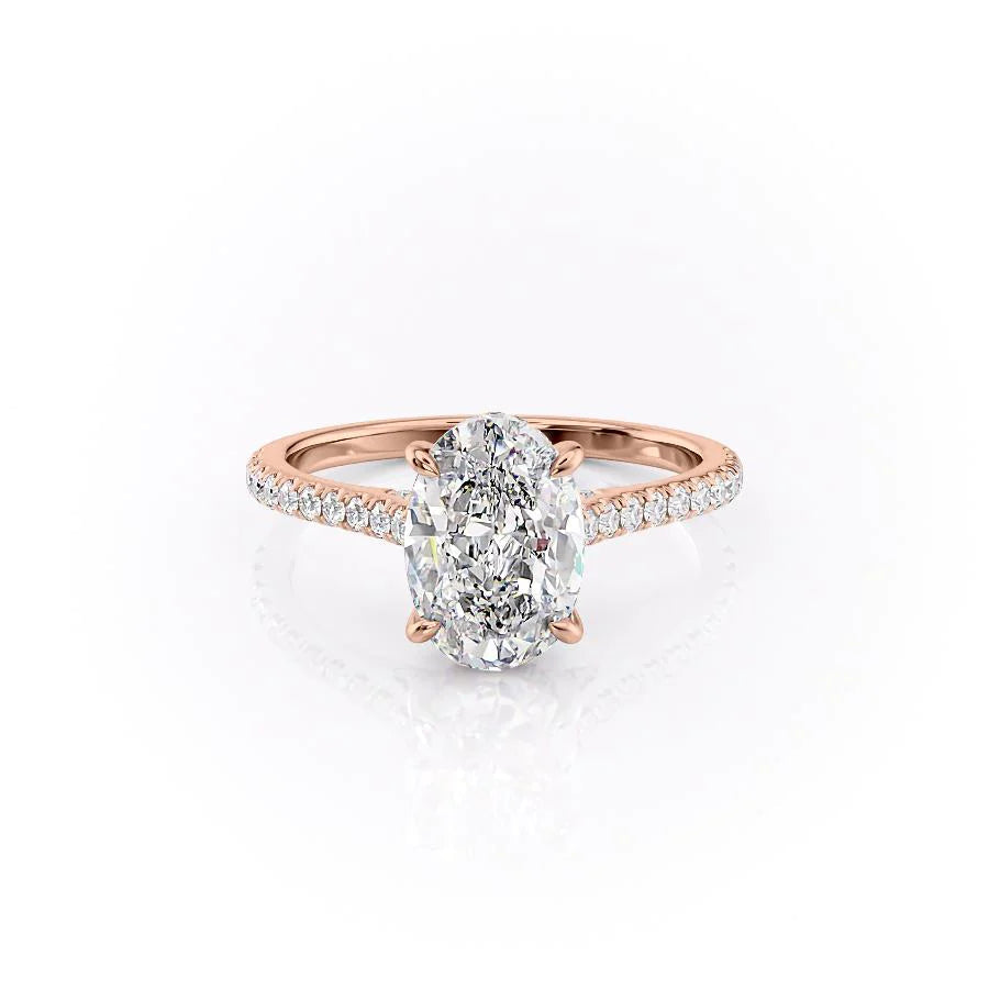 The Pave Natalie. A Rose Gold Hidden Halo Engagement Ring Set With A 2ct Oval Lab Grown Diamond. White Background.