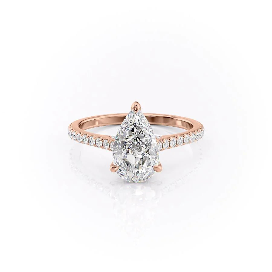 The Pave Natalie. A Rose Gold Hidden Halo Engagement Ring Set With A 2ct Pear Lab Grown Diamond. White Background.