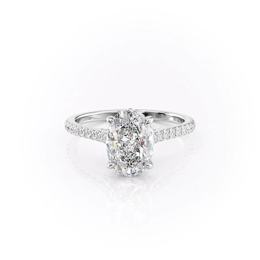 The Pave Natalie. A White Gold Hidden Halo Engagement Ring Set With A 2ct Oval Lab Grown Diamond. White Background.