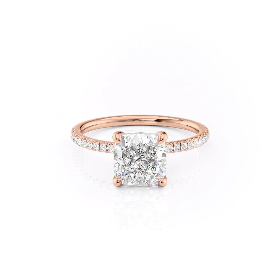 The Pave Nelly. A Rose Gold Hidden Halo Engagement Ring Set With A 2ct Cushion Lab Grown Diamond. White Background.