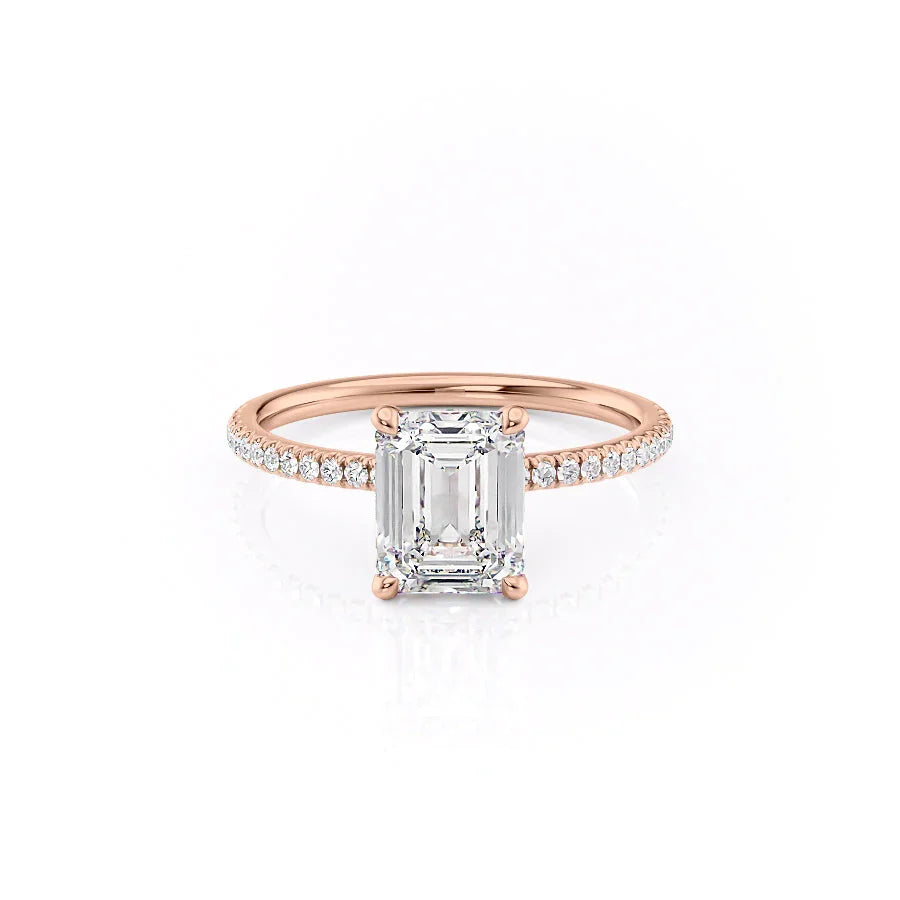 The Pave Nelly. A Rose Gold Hidden Halo Engagement Ring Set With A 2ct Emerald Lab Grown Diamond. White Background.