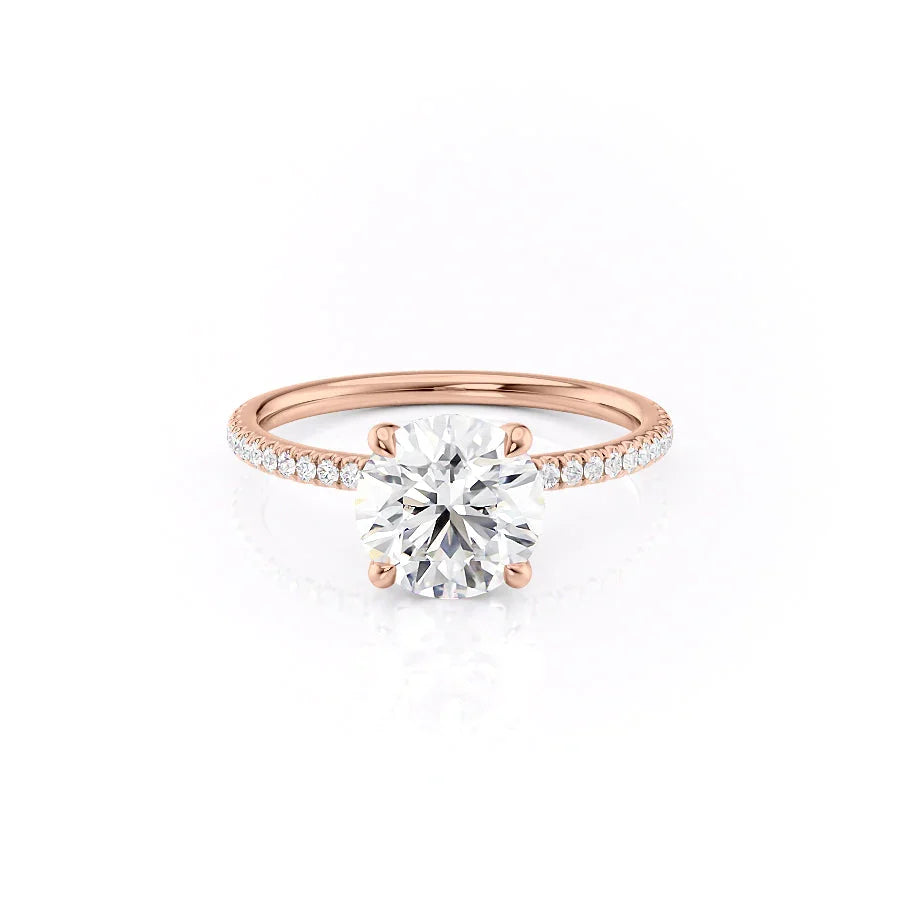 The Pave Nelly. A Rose Gold Hidden Halo Engagement Ring Set With A 2ct Round Lab Grown Diamond. White Background.
