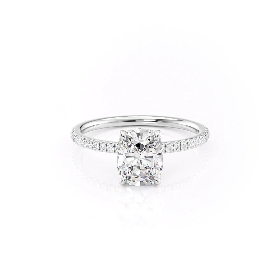The Pave Nelly. A White Gold Hidden Halo Engagement Ring Set With A 2ct Elongated Cushion Lab Grown Diamond. White Background.