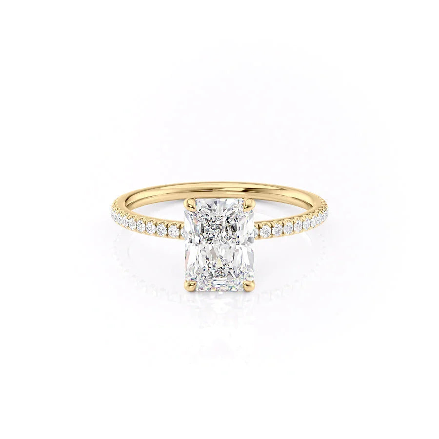 The Pave Nelly. A Yellow Gold Hidden Halo Engagement Ring Set With A 2ct Radiant Lab Grown Diamond. White Background.