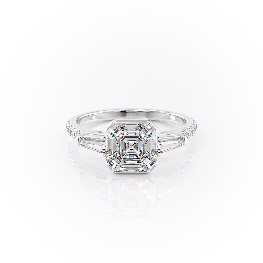 The Pave Parker. A White Gold Three Stone, Bezel Engagement Ring Set With A 2ct Asscher Lab Grown Diamond. White Background.