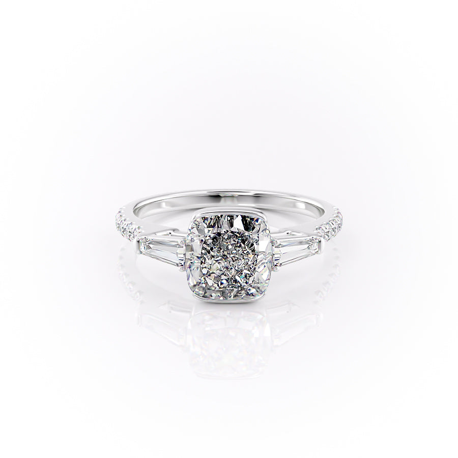 The Pave Parker. A White Gold Three Stone, Bezel Engagement Ring Set With A 2ct Cushion Lab Grown Diamond. White Background.