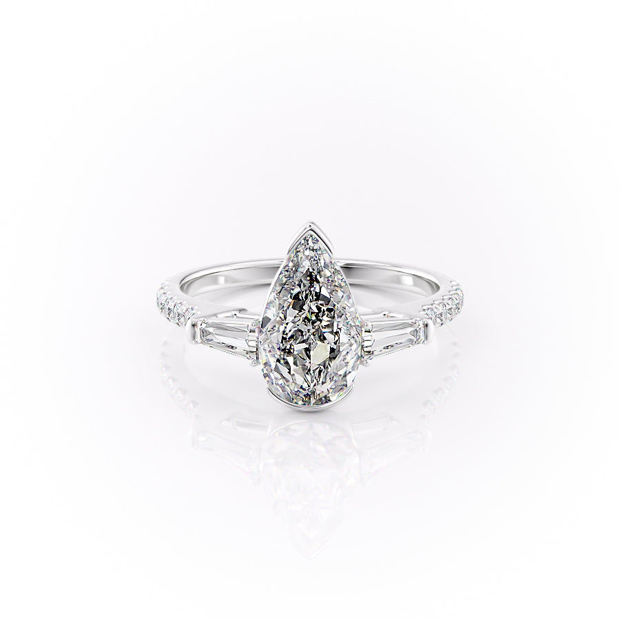 The Pave Parker. A White Gold Three Stone, Bezel Engagement Ring Set With A 2ct Pear Lab Grown Diamond. White Background.