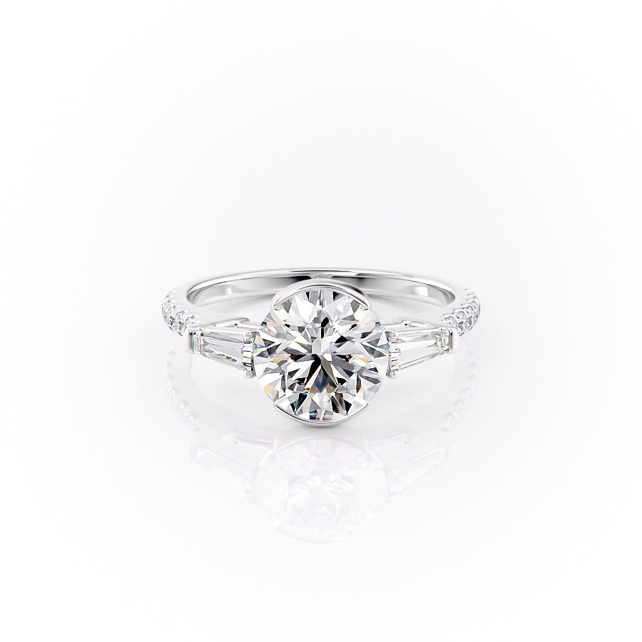 The Pave Parker. A White Gold Three Stone, Bezel Engagement Ring Set With A 2ct Round Lab Grown Diamond. White Background.