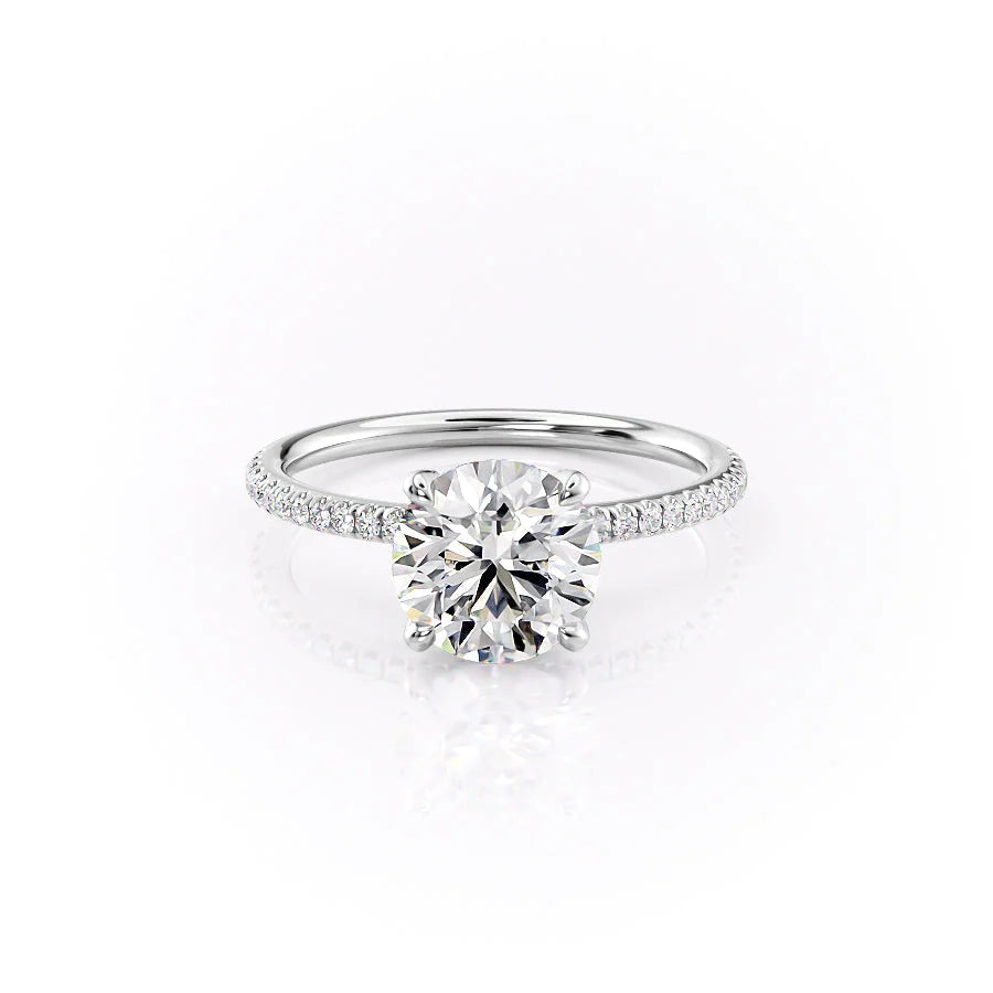 The Pave Petal Kamellie. A White Gold Nature Engagement Ring Set With A 2ct Round Lab Grown Diamond. White Background.