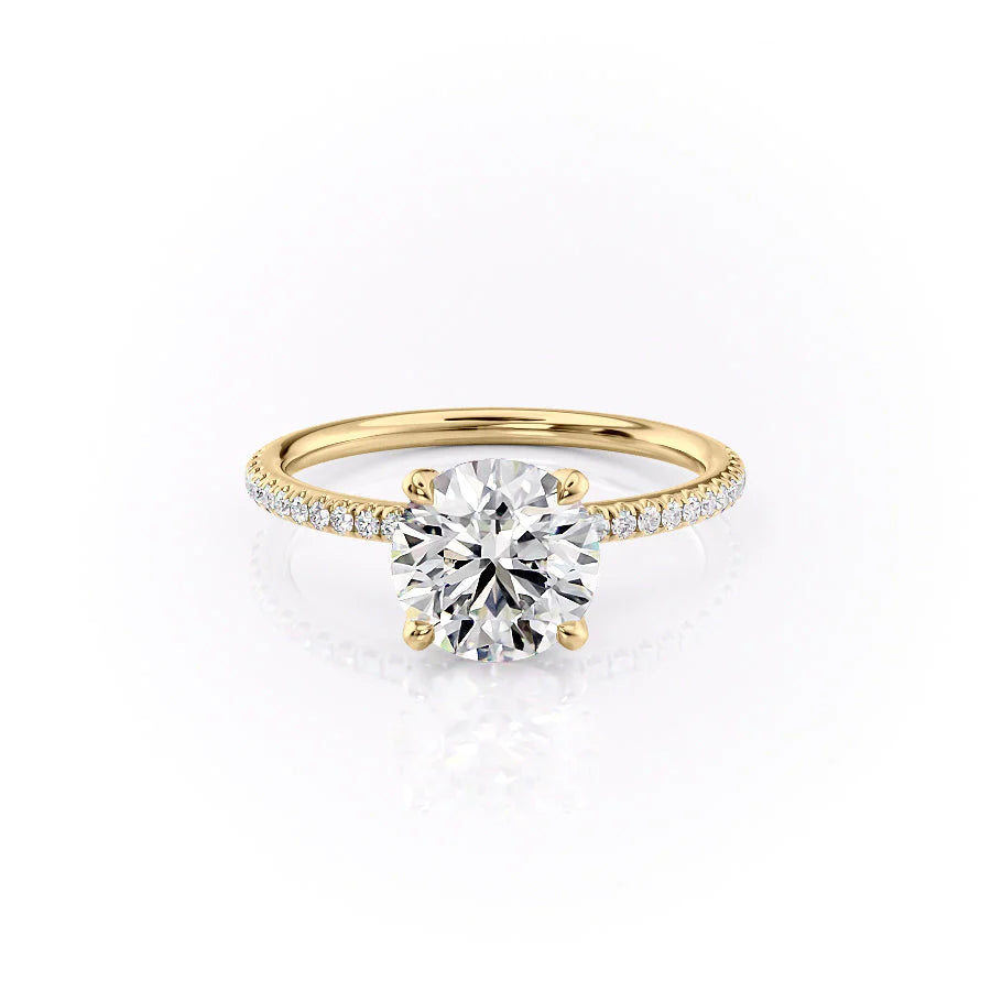 The Pave Petal Kamellie. A Yellow Gold Nature Engagement Ring Set With A 2ct Round Lab Grown Diamond. White Background.