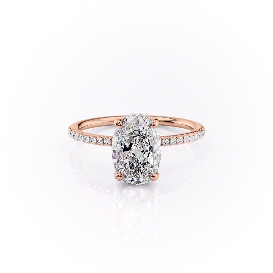 The Pave Sarah. A Rose Gold Hidden Halo Engagement Ring Set With A 2ct Oval Lab Grown Diamond. White Background.