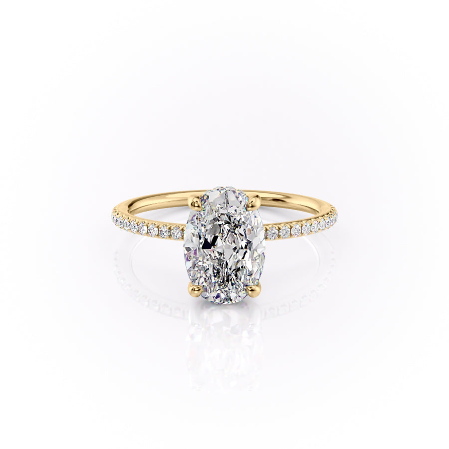 The Pave Sarah. A Yellow Gold Hidden Halo Engagement Ring Set With A 2ct Oval Lab Grown Diamond. White Background.