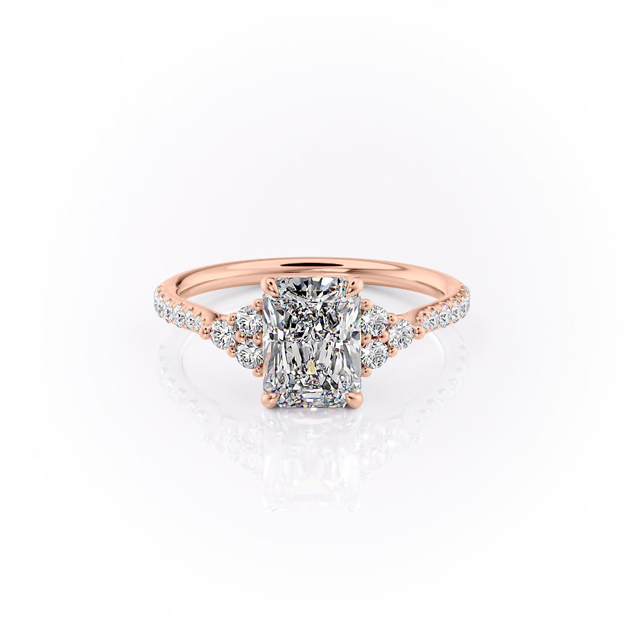 The Pave Scarlett. A Rose Gold Three Stone, Side Stones Engagement Ring Set With A 2ct Radiant Lab Grown Diamond. White Background.