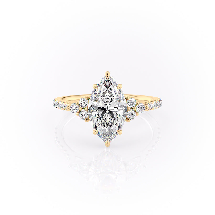 The Pave Scarlett. A Yellow Gold Three Stone, Side Stones Engagement Ring Set With A 2ct Marquise Lab Grown Diamond. White Background.