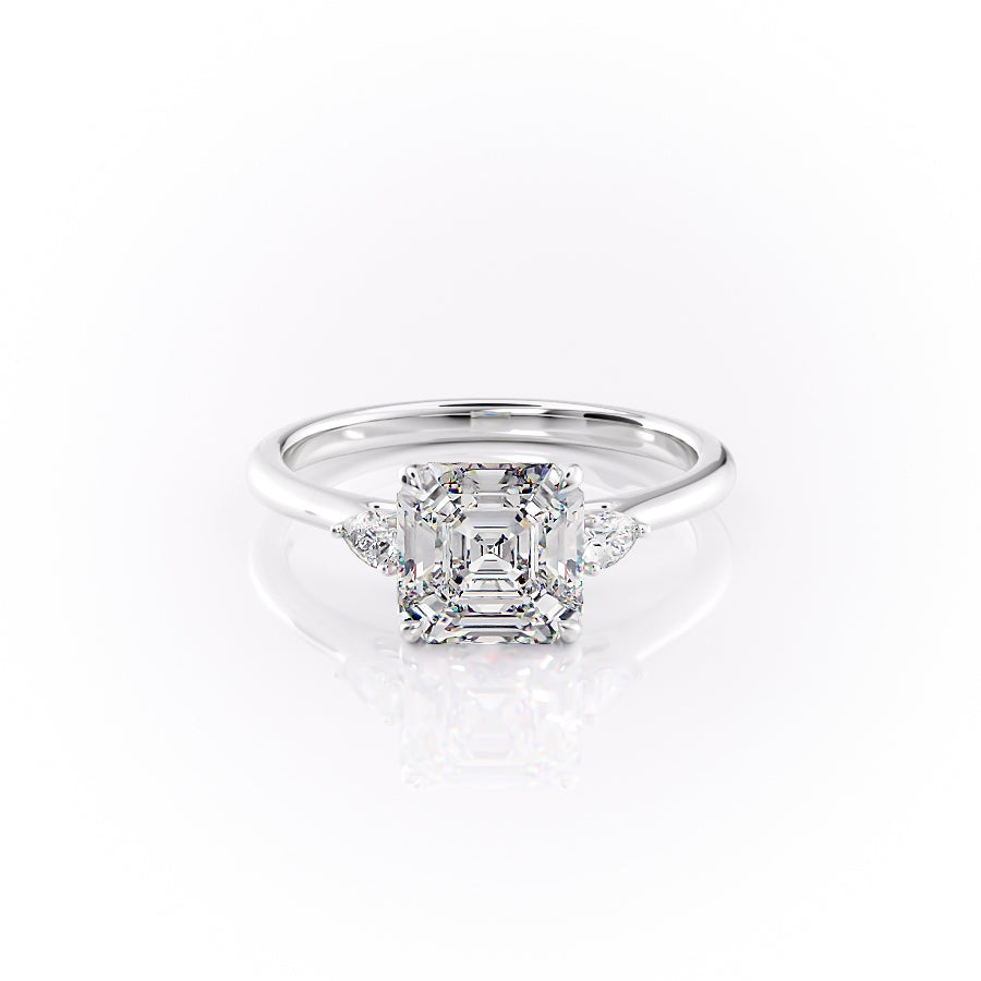 The Pears Liv. A White Gold Three Stone Engagement Ring Set With A 2ct Asscher Lab Grown Diamond. White Background.