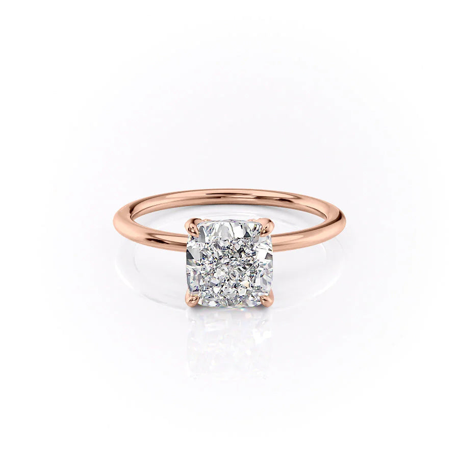 The Petal Kamellie. A Rose Gold Solitaire, Nature Engagement Ring Set With A 2ct Cushion Lab Grown Diamond. White Background.