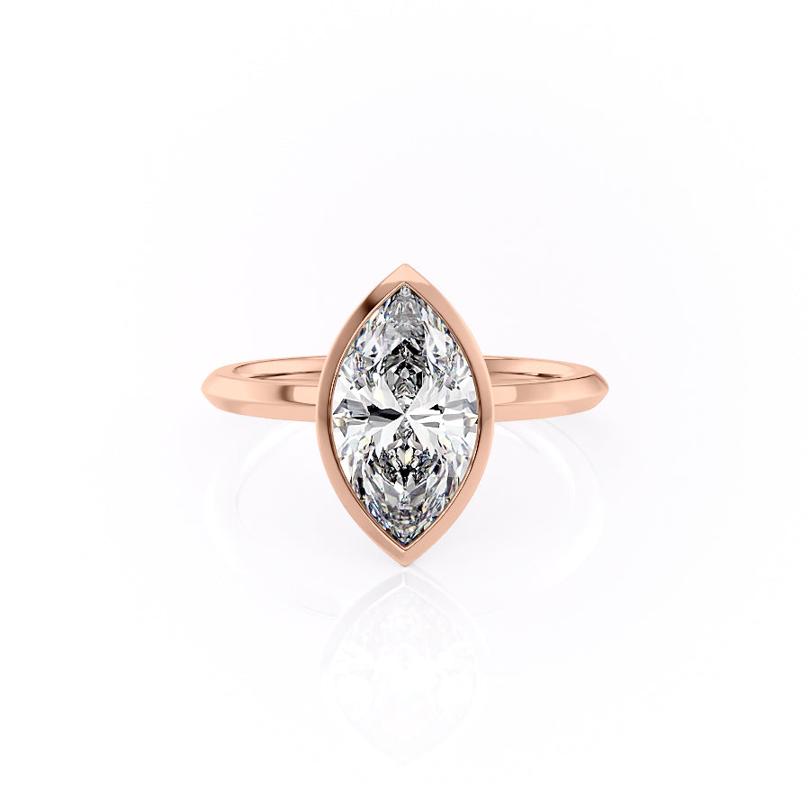 The Razor Bezel Kamellie. A Rose Gold Solitaire Engagement Ring Set With A 2ct Marquise Lab Grown Diamond. White Background.