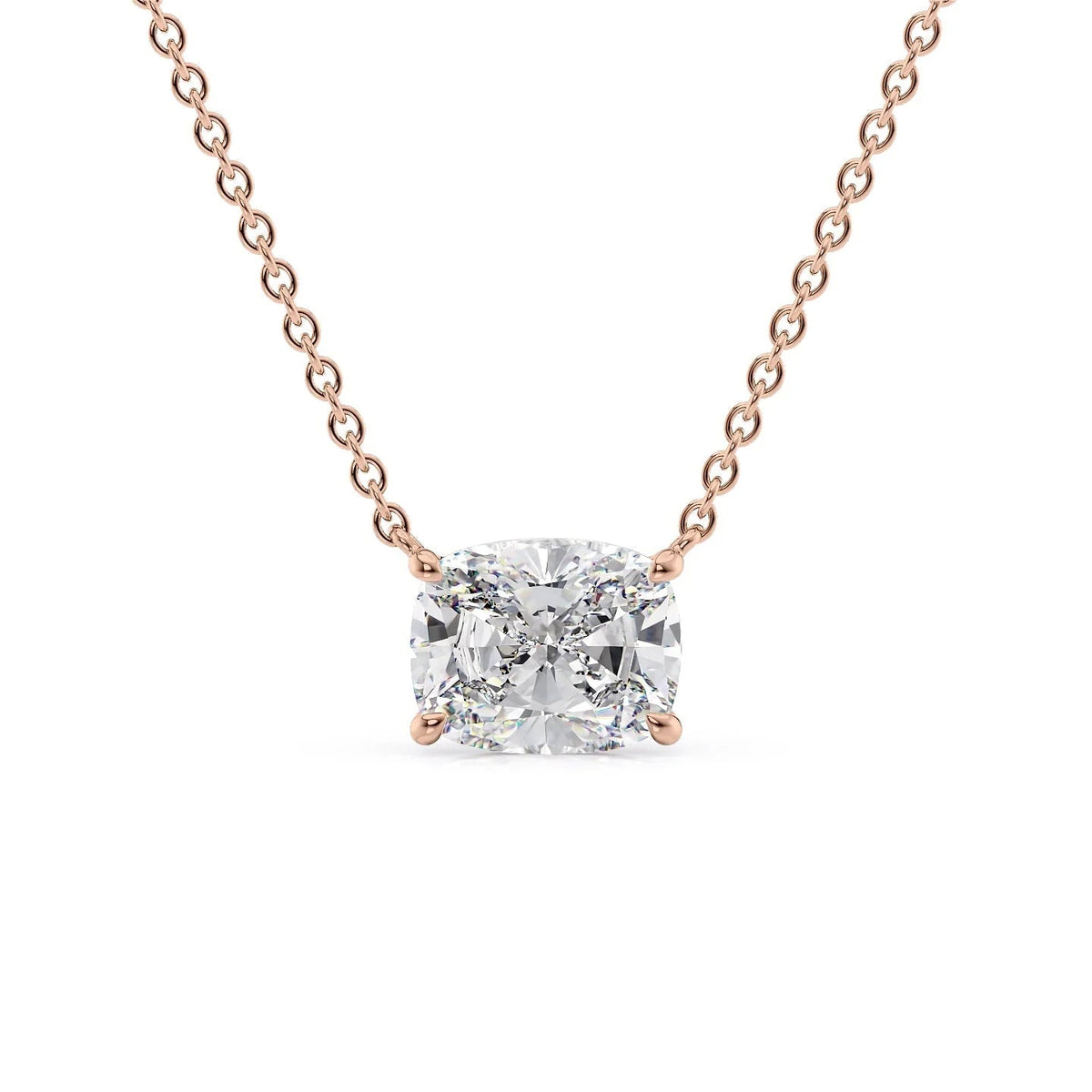 The Riley. A Rose Gold Pendant Set With A 2ct Elongated Cushion Lab Grown Diamond. White Background.
