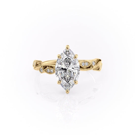 The Robin. A Yellow Gold Vintage, Nature, Hidden Halo, Side Stones Engagement Ring Set With A 2ct Marquise Lab Grown Diamond. White Background.