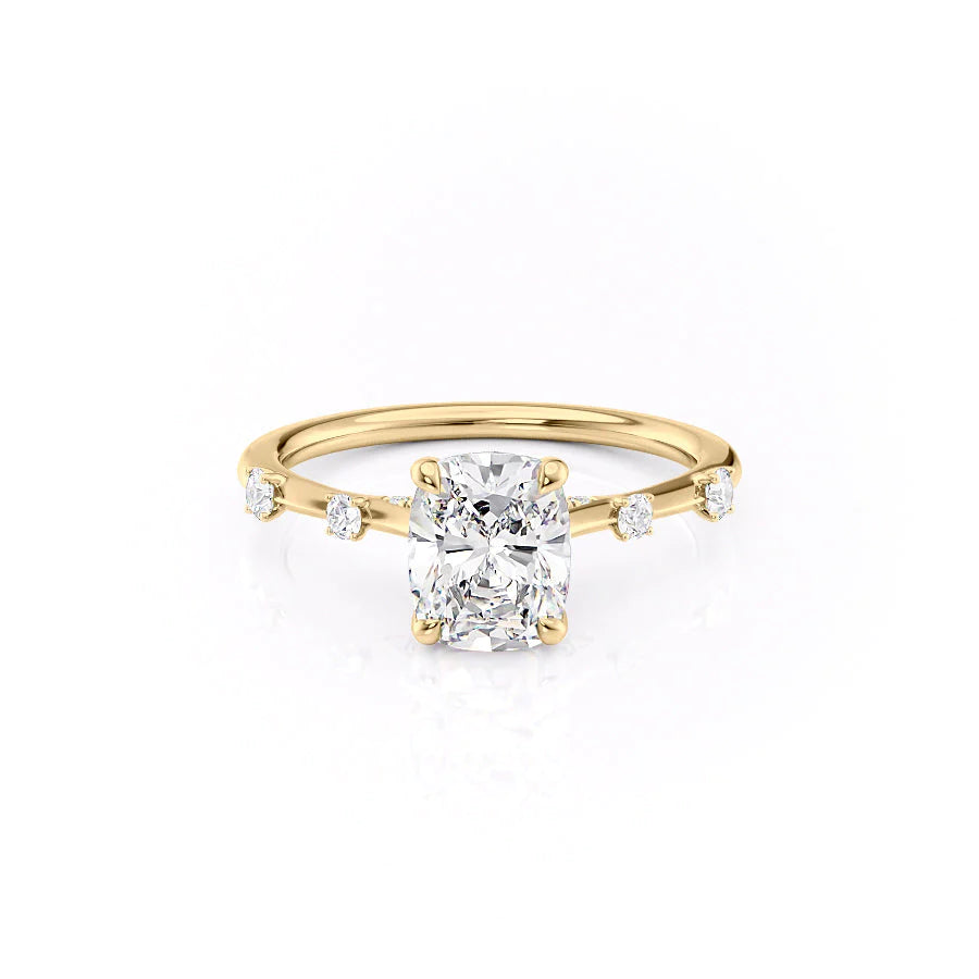 The Serena. A Yellow Gold Side Stones Engagement Ring Set With A 2ct Elongated Cushion Lab Grown Diamond. White Background.
