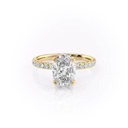 The Sofia. A Yellow Gold Pave, Hidden Halo Engagement Ring Set With A 2ct Oval Lab Grown Diamond. White Background.