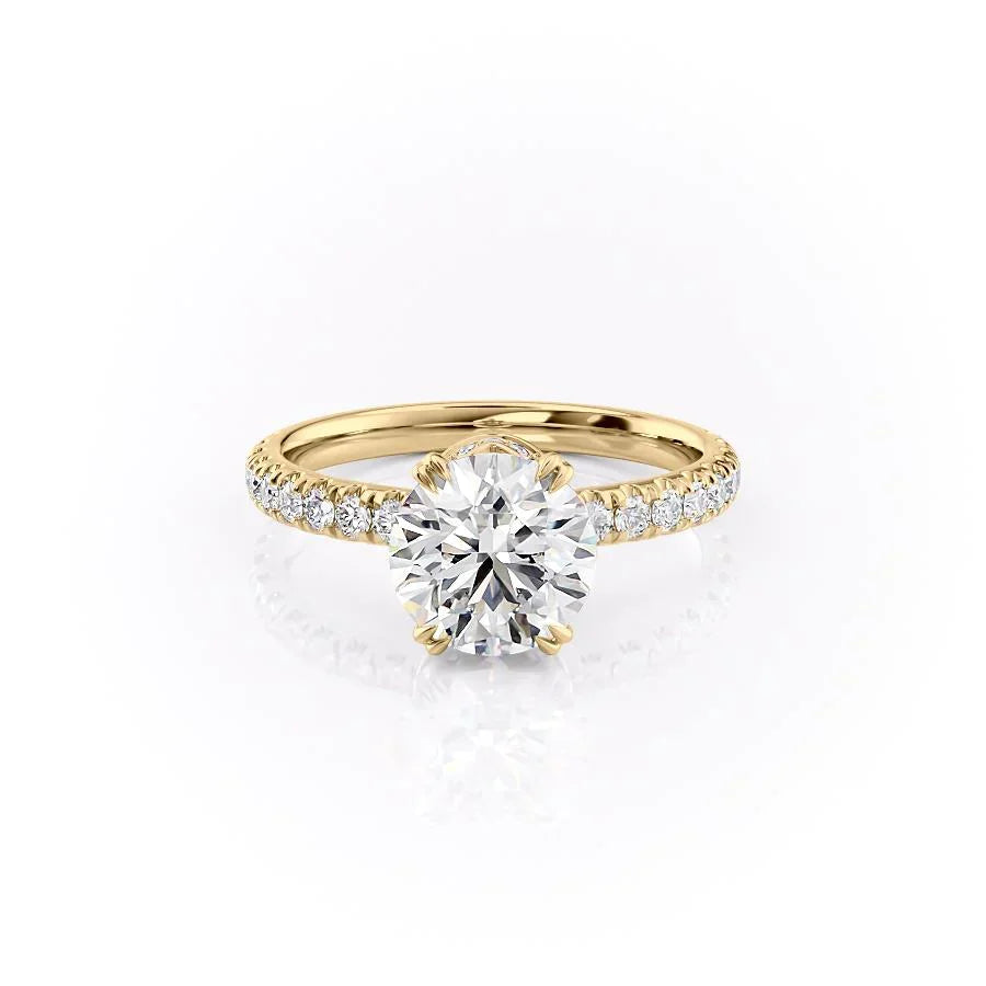 The Sofia. A Yellow Gold Pave, Hidden Halo Engagement Ring Set With A 2ct Round Lab Grown Diamond. White Background.