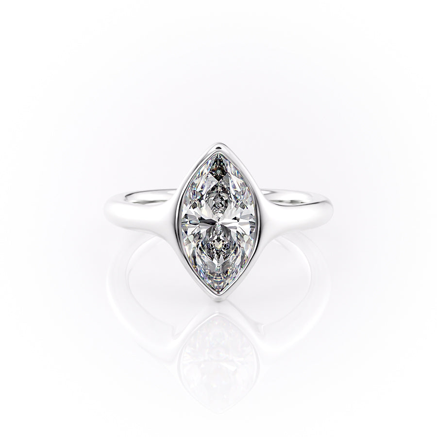 The Stella. A White Gold Vintage, Solitaire Engagement Ring Set With A 2ct Marquise Lab Grown Diamond. White Background.