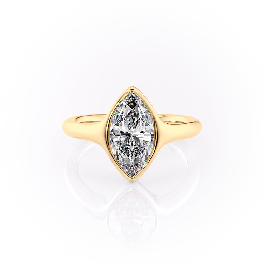 The Stella. A Yellow Gold Vintage, Solitaire Engagement Ring Set With A 2ct Marquise Lab Grown Diamond. White Background.