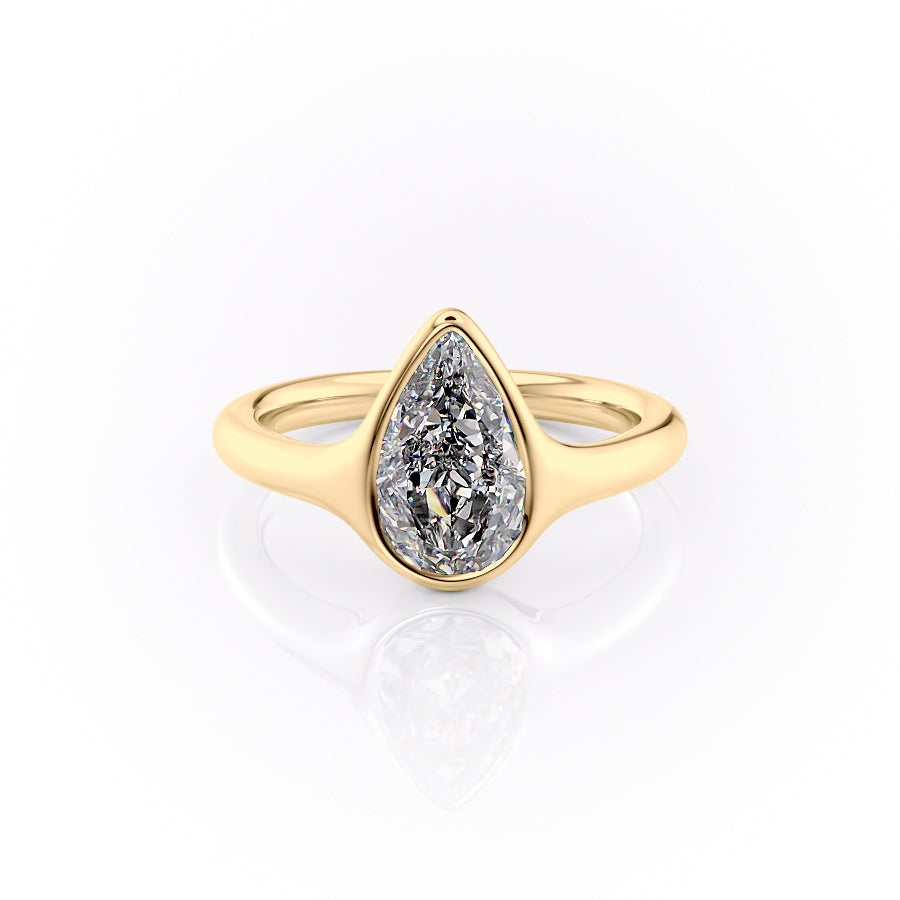 The Stella. A Yellow Gold Vintage, Solitaire Engagement Ring Set With A 2ct Pear Lab Grown Diamond. White Background.