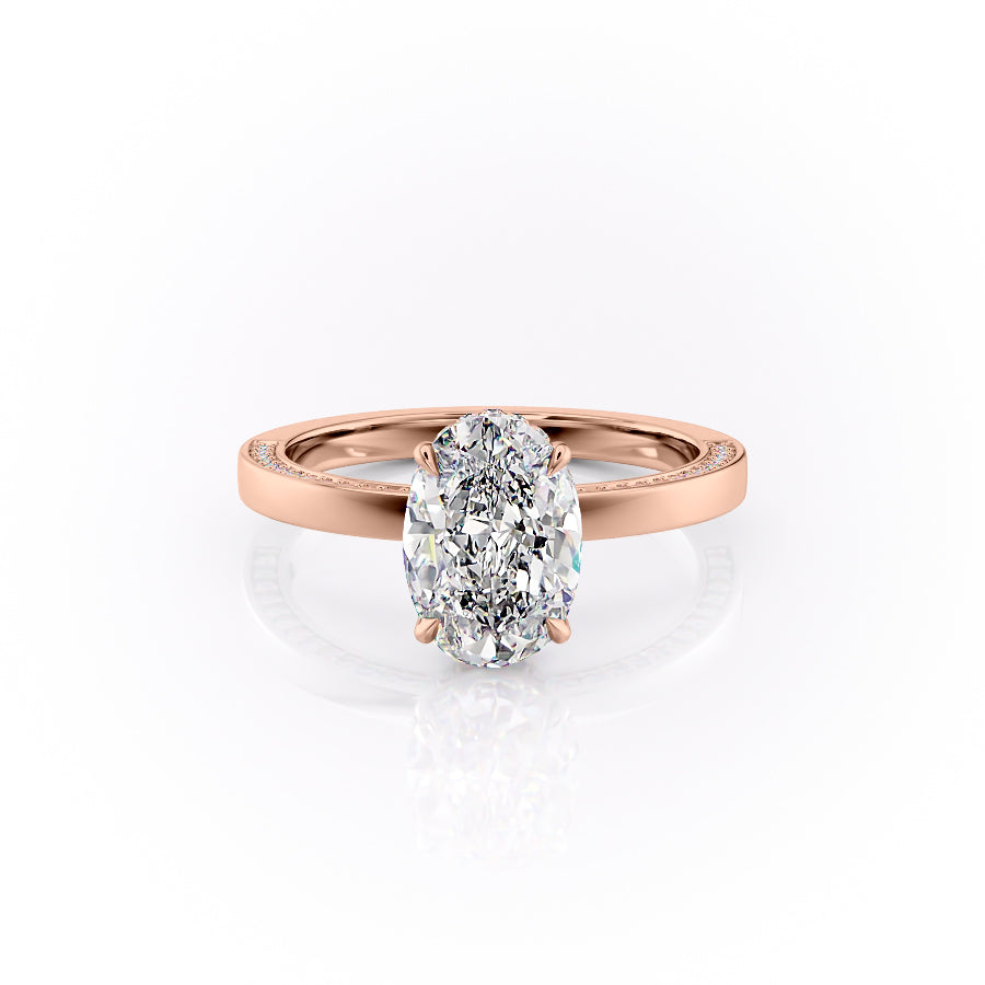 The Sydney. A Rose Gold Hidden Halo, Solitaire, Pave Engagement Ring Set With A 2ct Oval Lab Grown Diamond. White Background.