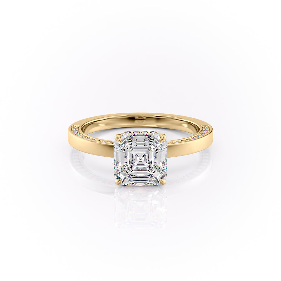 The Sydney. A Yellow Gold Hidden Halo, Solitaire, Pave Engagement Ring Set With A 2ct Asscher Lab Grown Diamond. White Background.