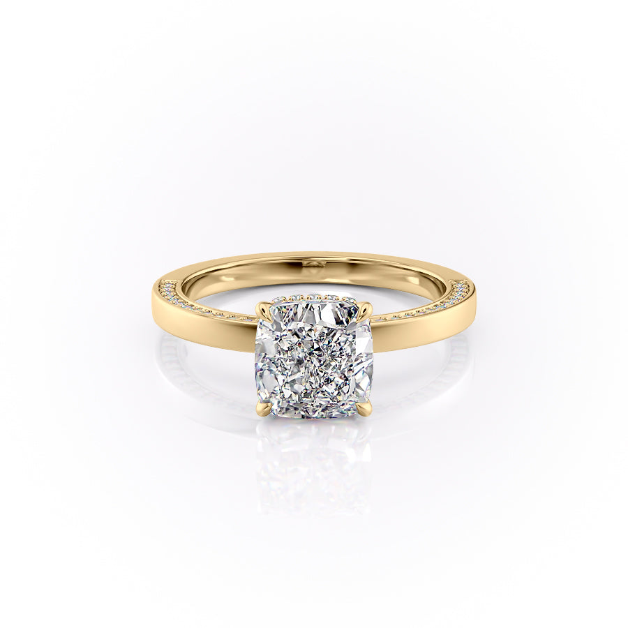 The Sydney. A Yellow Gold Hidden Halo, Solitaire, Pave Engagement Ring Set With A 2ct Cushion Lab Grown Diamond. White Background.