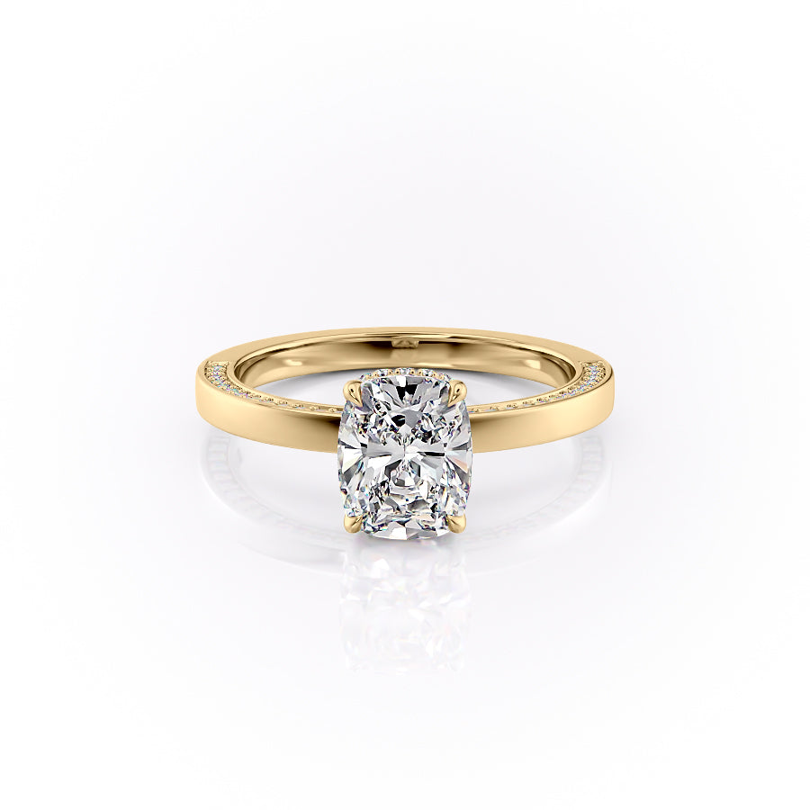 The Sydney. A Yellow Gold Hidden Halo, Solitaire, Pave Engagement Ring Set With A 2ct Elongated Cushion Lab Grown Diamond. White Background.