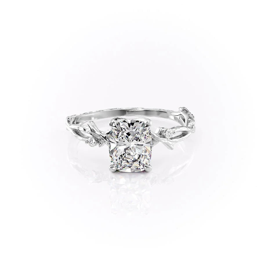 The Textured Twig. A White Gold Solitaire, Nature, Three Stone, Side Stones Engagement Ring Set With A 2ct Elongated Cushion Lab Grown Diamond. White Background.