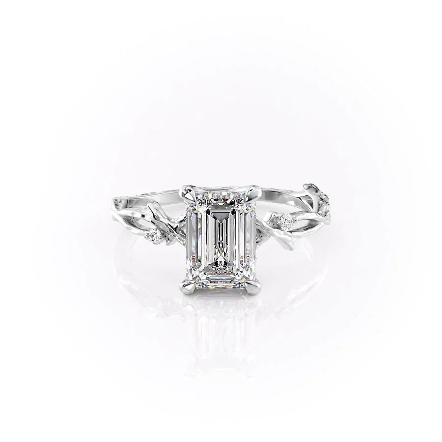 The Textured Twig. A White Gold Solitaire, Nature, Three Stone, Side Stones Engagement Ring Set With A 2ct Emerald Lab Grown Diamond. White Background.