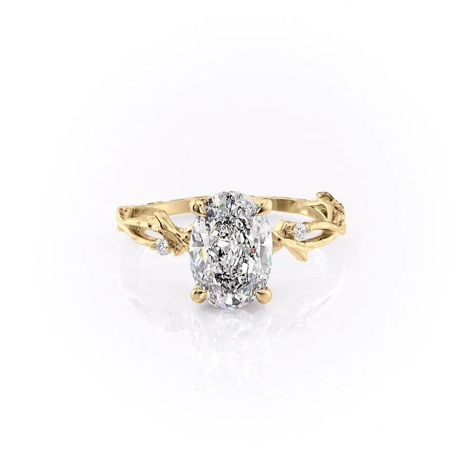 The Textured Twig. A Yellow Gold Solitaire, Nature, Three Stone, Side Stones Engagement Ring Set With A 2ct Oval Lab Grown Diamond. White Background.